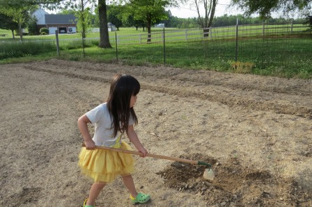 Girls planting the garden